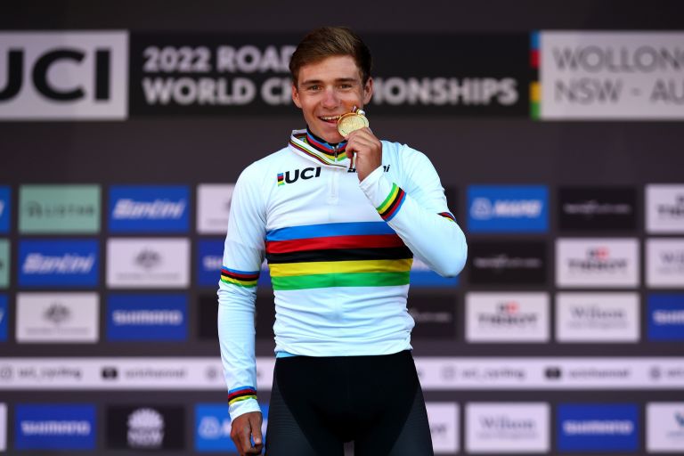 Remco Evenepoel shows off World Champion jersey at team training camp